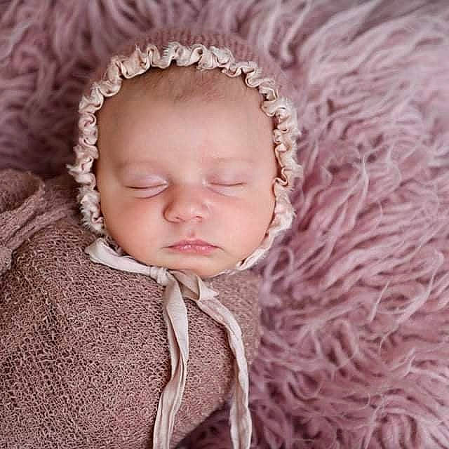 Jillian is registered to the contest to win money with this photo: baby, baby_toddler_clothing, eye, eyebrow, eyelash, happy, head, headgear, human_body, iris, lip, magenta, nose, outerwear, person, pink, skin, sleeve, textile, toddler