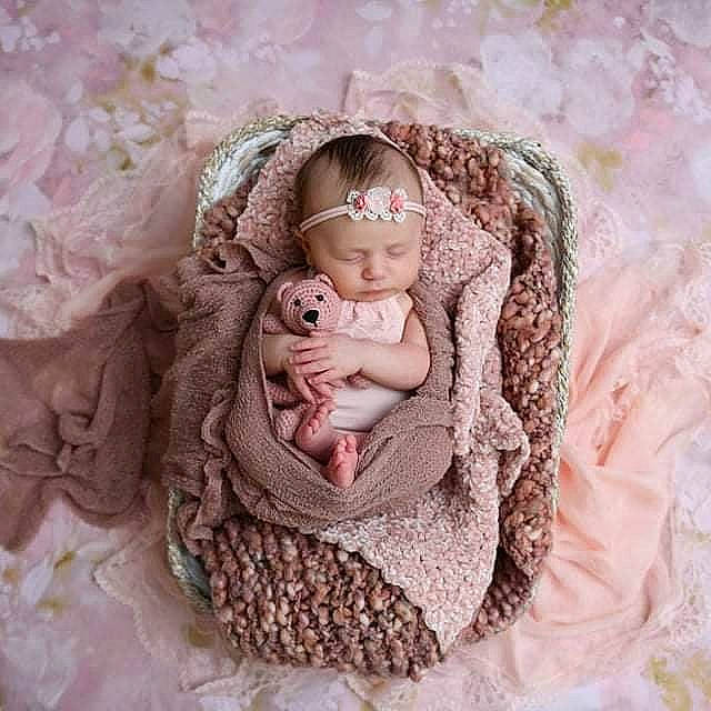 Jillian joined the competition — help win amazing prizes! baby, bridal_accessory, clothing, doll, dress, embellishment, eye, eyelash, hand, head, headgear, headpiece, iris, pattern, person, petal, pink, sleeve, textile, toy