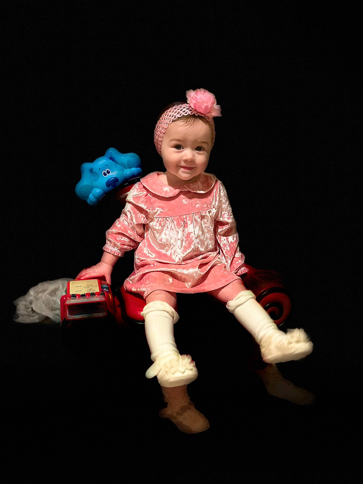 Genevieve joined the competition — help win amazing prizes! baby, baby_toddler_clothing, carmine, cheek, child, doll, entertainment, event, fashion_accessory, flash_photography, fun, gesture, human_body, joy, magenta, person, sitting, sleeve, toddler, toy