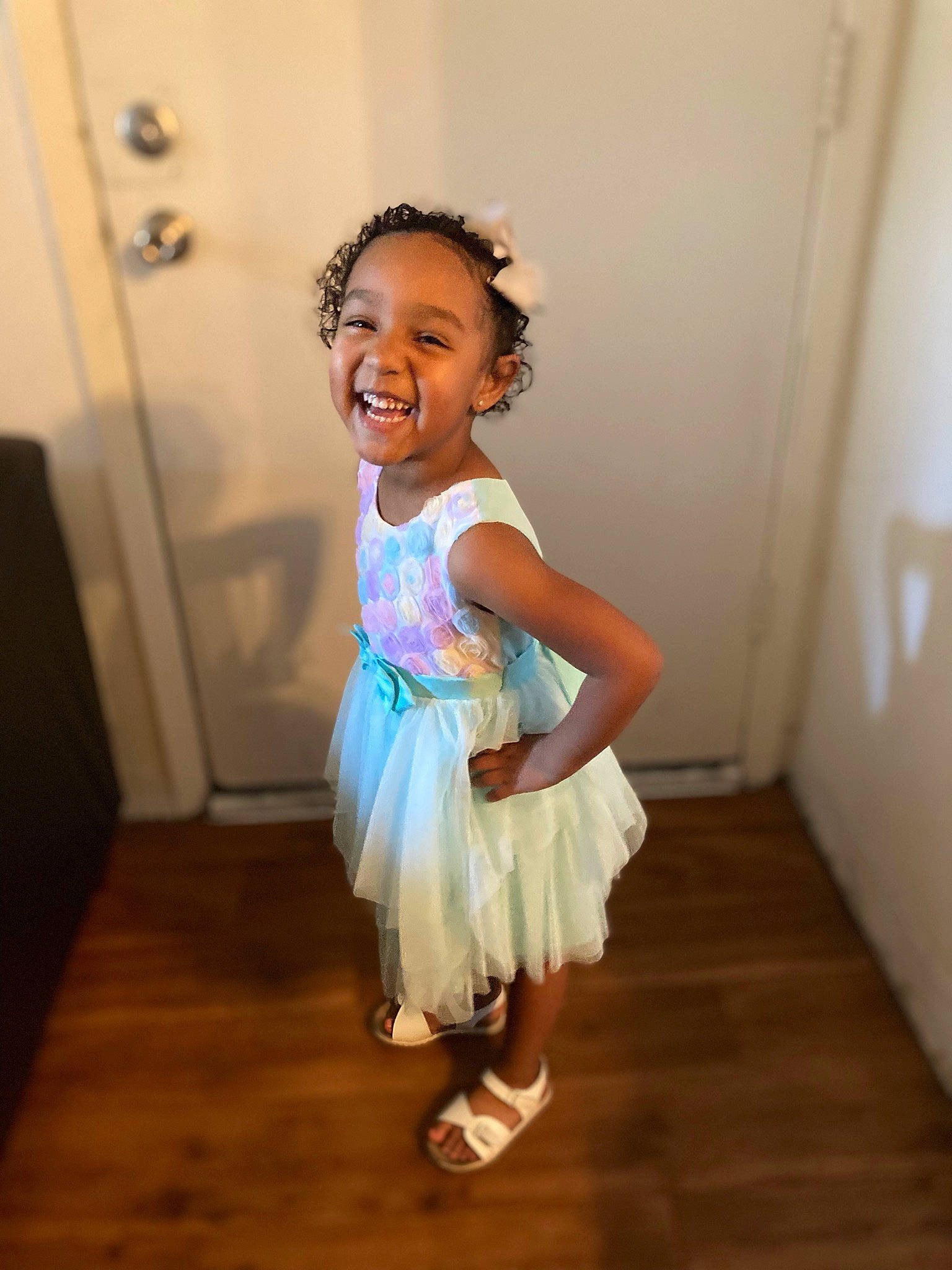 Yana is registered to the contest to win money with this photo: baby_toddler_clothing, clothing, day_dress, dress, face, fashion_design, flash_photography, floor, flooring, fun, happy, hardwood, iris, joy, one_piece_garment, person, shoulder, skin, smile, standing