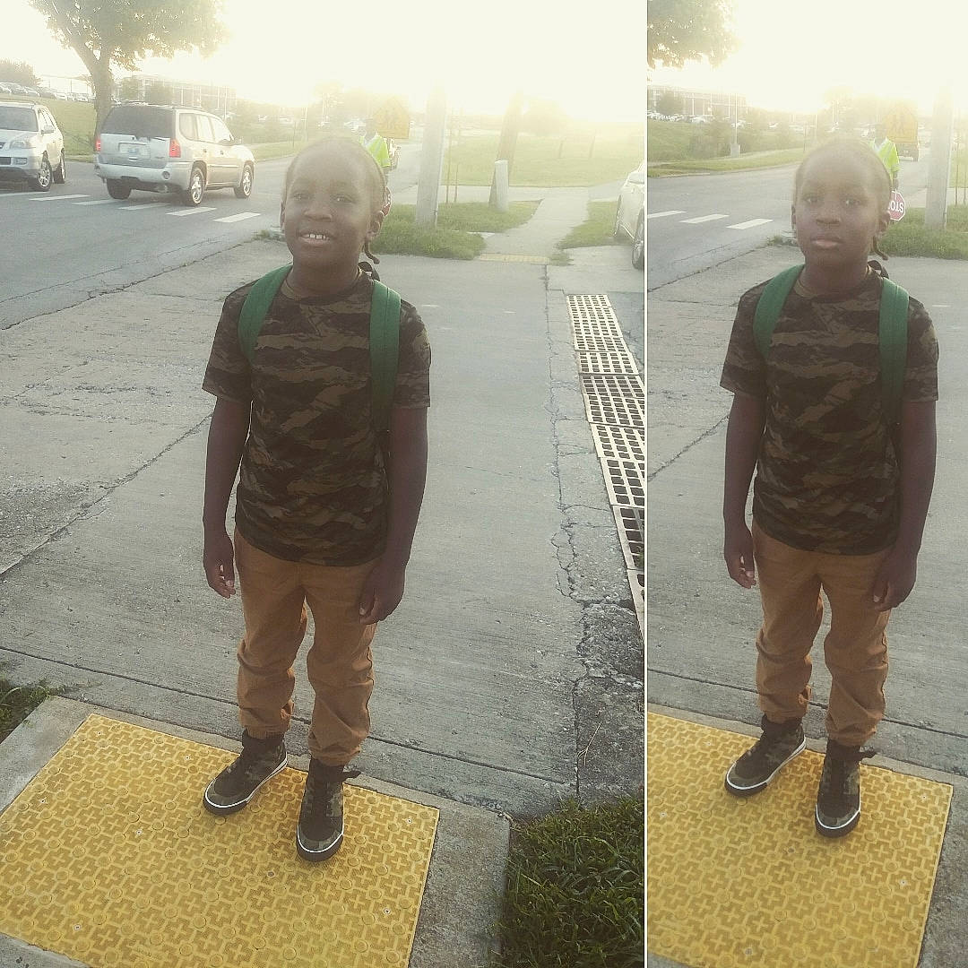 Abram is registered to the contest to win money with this photo: cool, jacket, joy, outerwear, person, photography, shadow, shoe, snapshot, standing, water