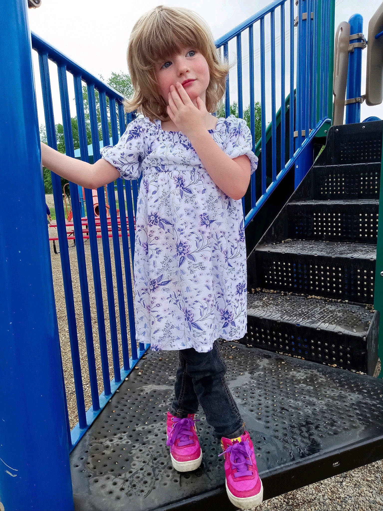 Sydney is registered to the contest to win money with this photo: blue, denim, dress, electric_blue, fun, happy, leg, leisure, magenta, person, pink, shoe, sky, sleeve, sneakers, stairs, standing, t_shirt, thigh, toddler