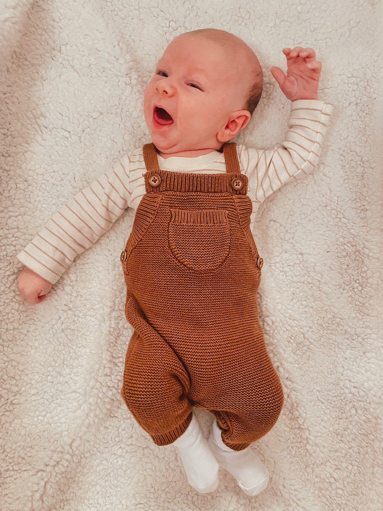 Romer joined the competition — help win amazing prizes! arm, baby, baby_products, baby_sleeping, baby_toddler_clothing, cheek, child, collar, face, finger, gesture, hand, outerwear, pattern, person, skin, sleeve, textile, thumb, toddler