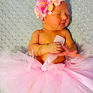 Bexley joined the competition — help win amazing prizes! baby, bodypart, clothing, costume, dancing, dress, face, finger, flower, flowerarrangement, flowerbouquet, hand, head, leisureactivities, newborn, person, petal, photography, plant, portrait
