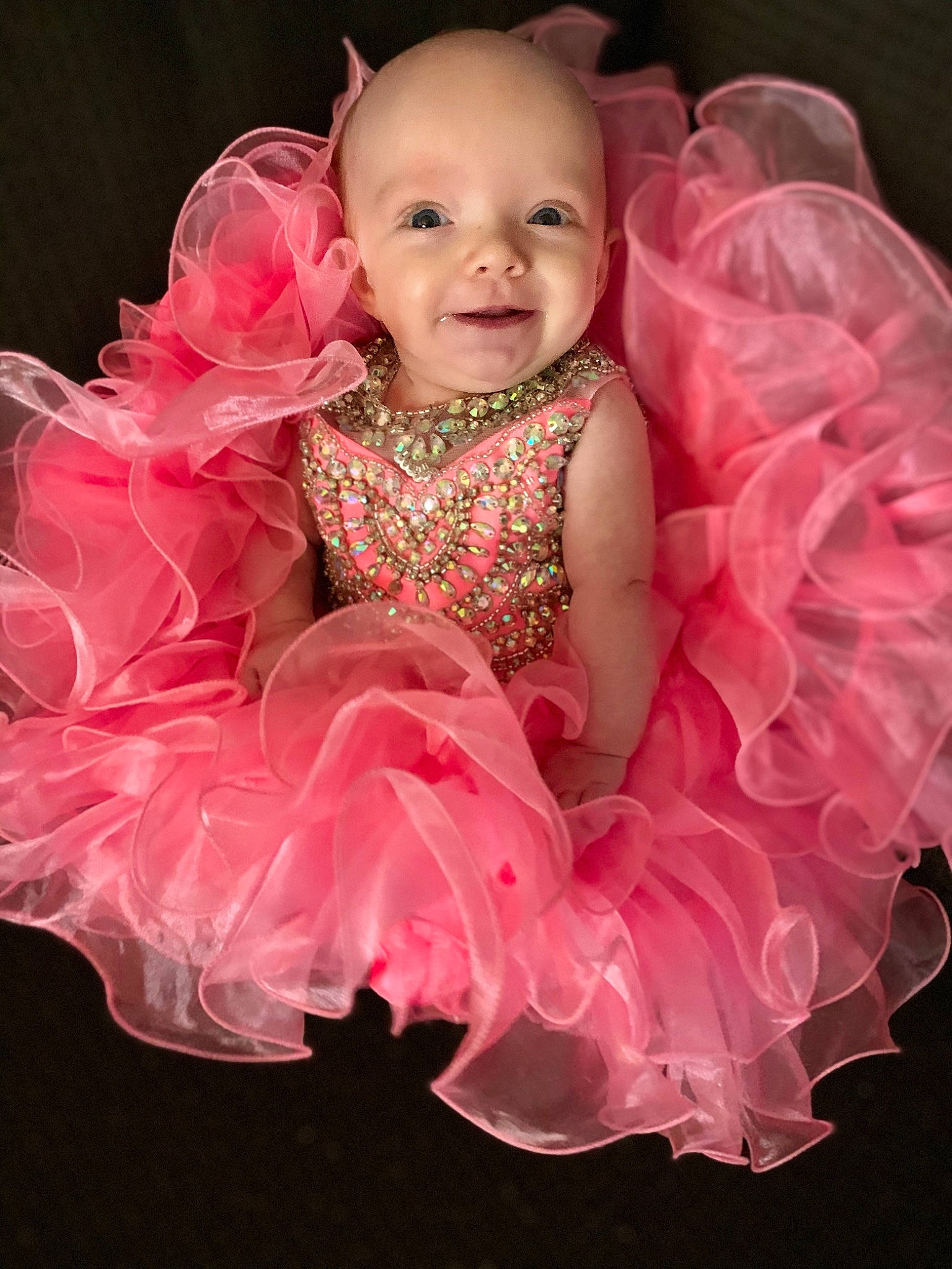 Hadleigh joined the competition — help win amazing prizes! baby, baby_toddler_clothing, ballet_tutu, child, dress, embellishment, event, face, flash_photography, happy, headgear, headpiece, magenta, pattern, person, petal, pink, ruffle, sleeve, smile