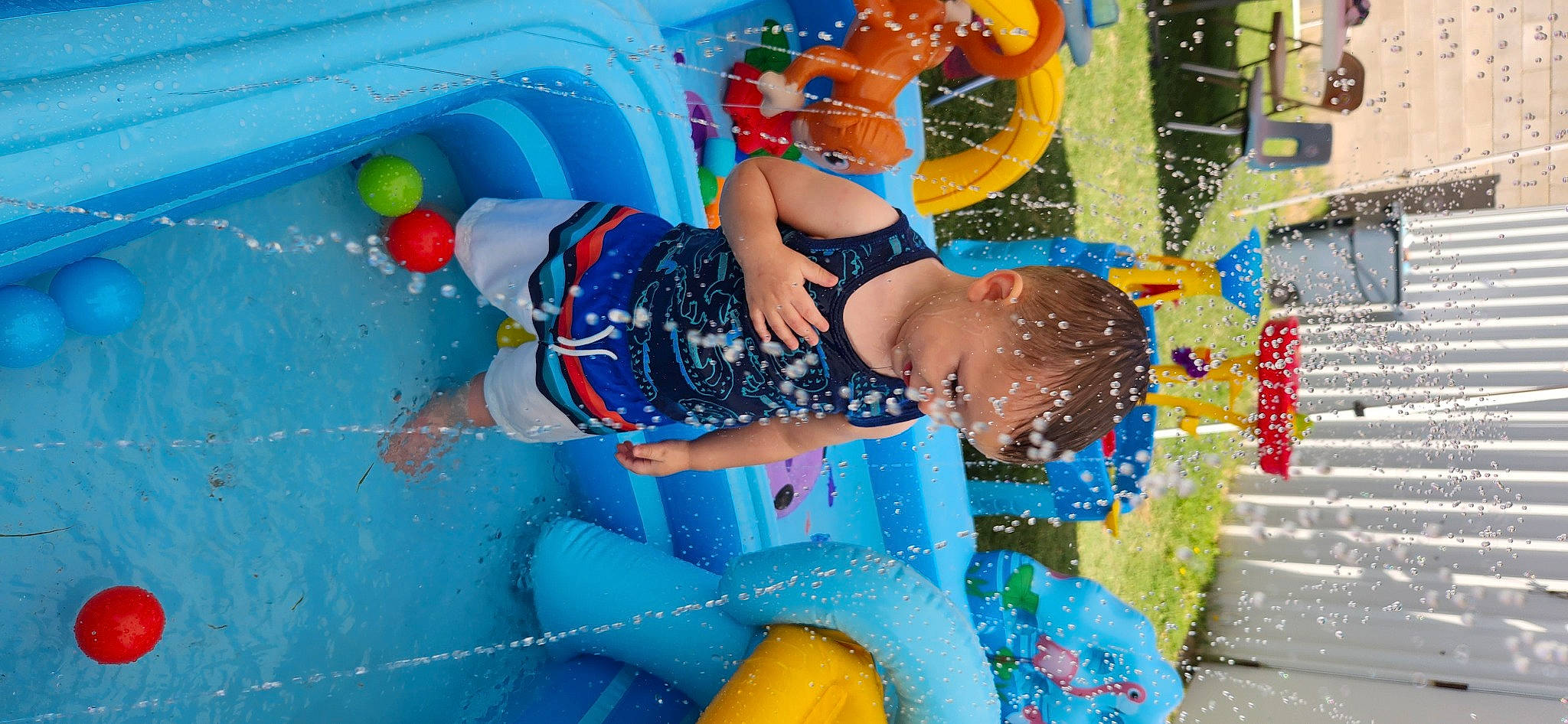 Miguel joined the competition — help win amazing prizes! amusement_park, bathing, child, electric_blue, event, fun, happy, human_leg, inflatable, leg, leisure, nonbuilding_structure, person, plastic, play, recreation, thigh, vacation, water, water_park