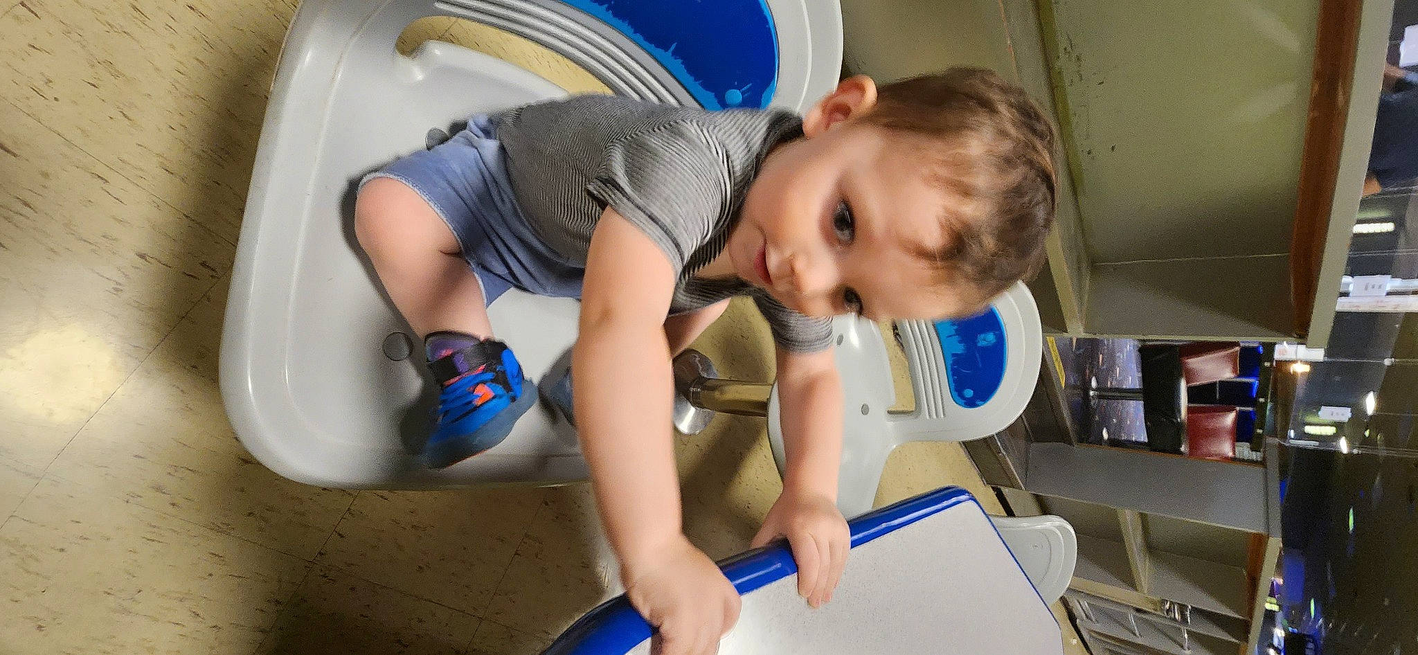 Miguel is registered to the contest to win money with this photo: auto_part, automotive_tire, baby_products, blue, child, comfort, elbow, electric_blue, finger, fun, knee, leisure, person, play, recreation, room, sitting, t_shirt, toddler, vacation