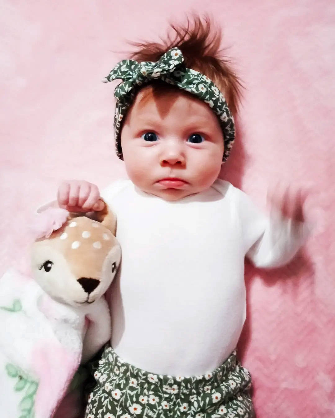 Amber is registered to the contest to win money with this photo: baby, baby_toddler_clothing, cap, doll, dress, eyelash, fawn, finger, hairstyle, hand, happy, headwear, iris, lip, person, pink, skin, sleeve, textile, toddler