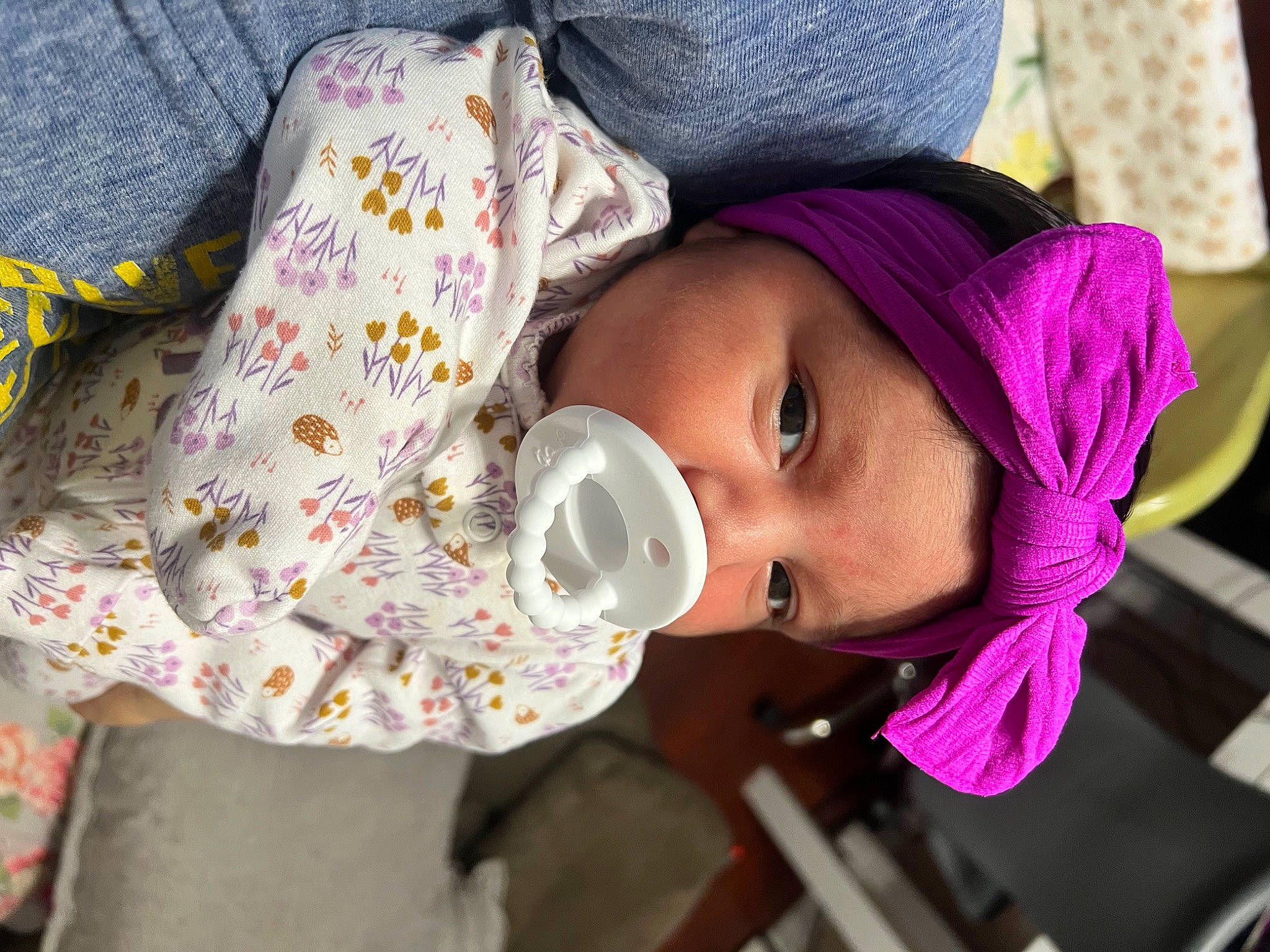 Everleigh is registered to the contest to win money with this photo: baby_toddler_clothing, cheek, clothing, eye, eyelash, face, head, headgear, lip, mammal, mouth, nose, outerwear, person, pink, product, purple, skin, textile, toddler