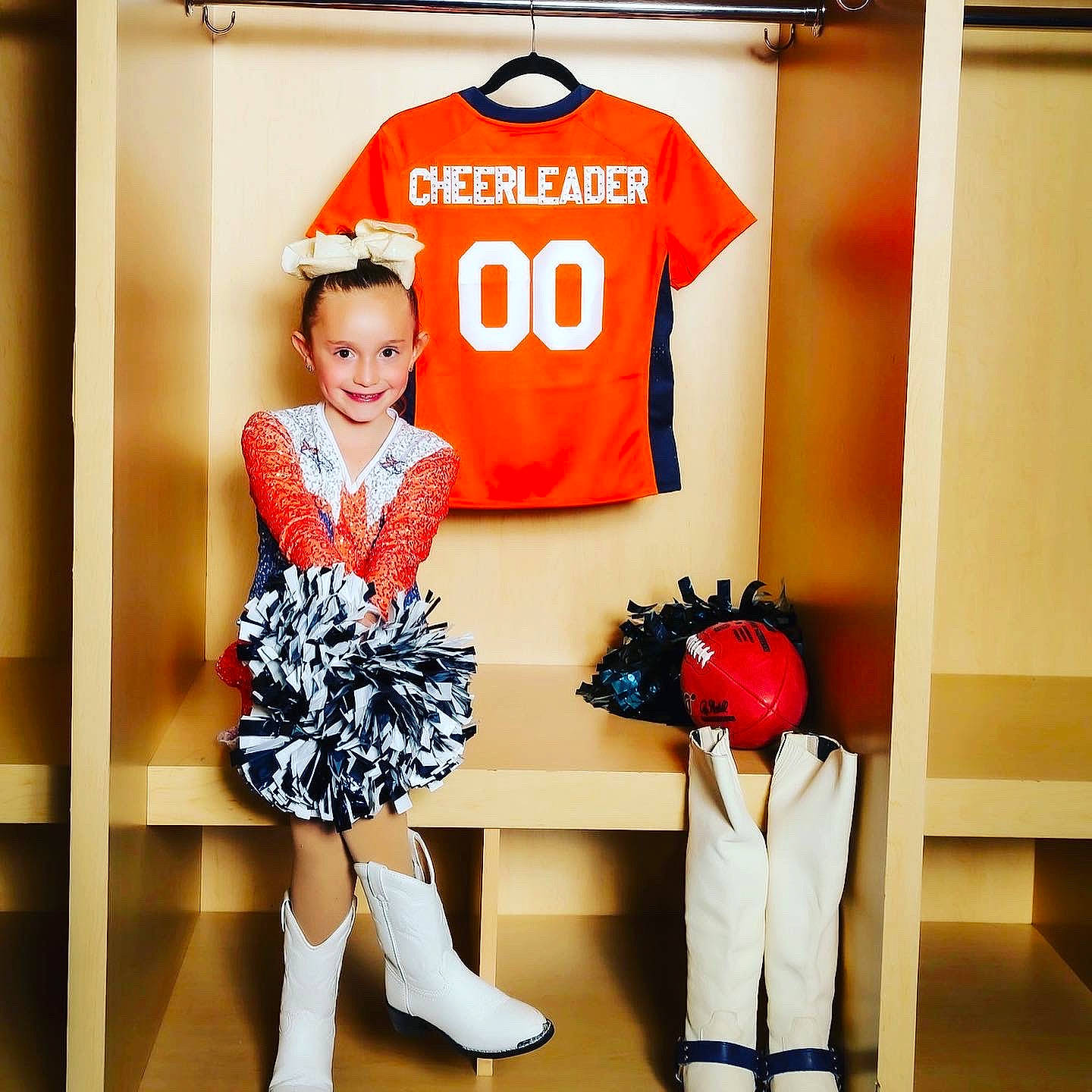 Faithlyn is registered to the contest to win money with this photo: child, clothing, costume, dress, fashion, footwear, jersey, joy, orange, pattern, person, product, red, room, shoe, sleeve, sports_uniform, sportswear, t_shirt, trousers