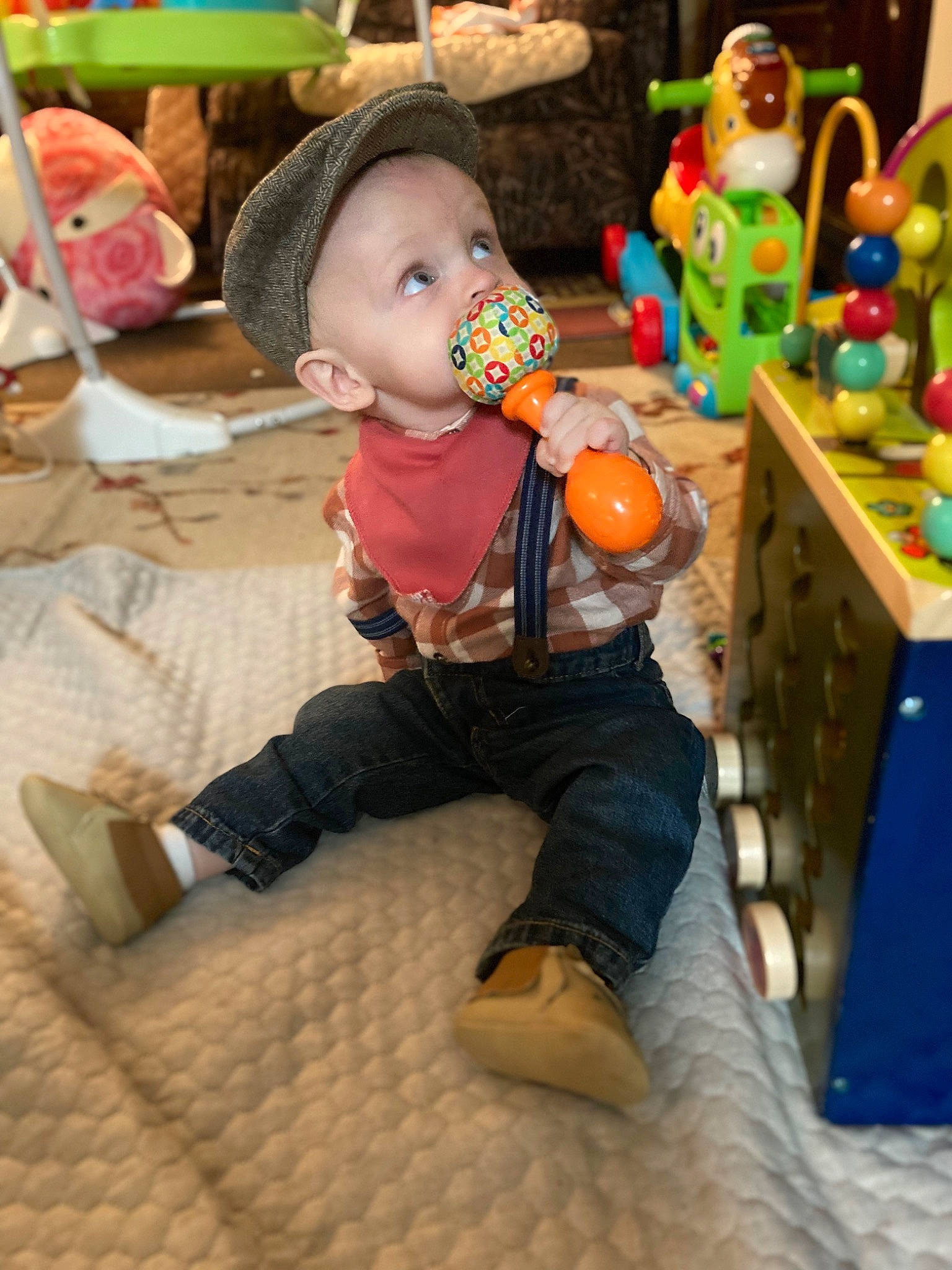 Jaiden is registered to the contest to win money with this photo: baby, baby_toddler_clothing, baby_toys, child, comfort, flooring, fun, happy, head, person, play, room, sitting, snapshot, sock, toddler, toy