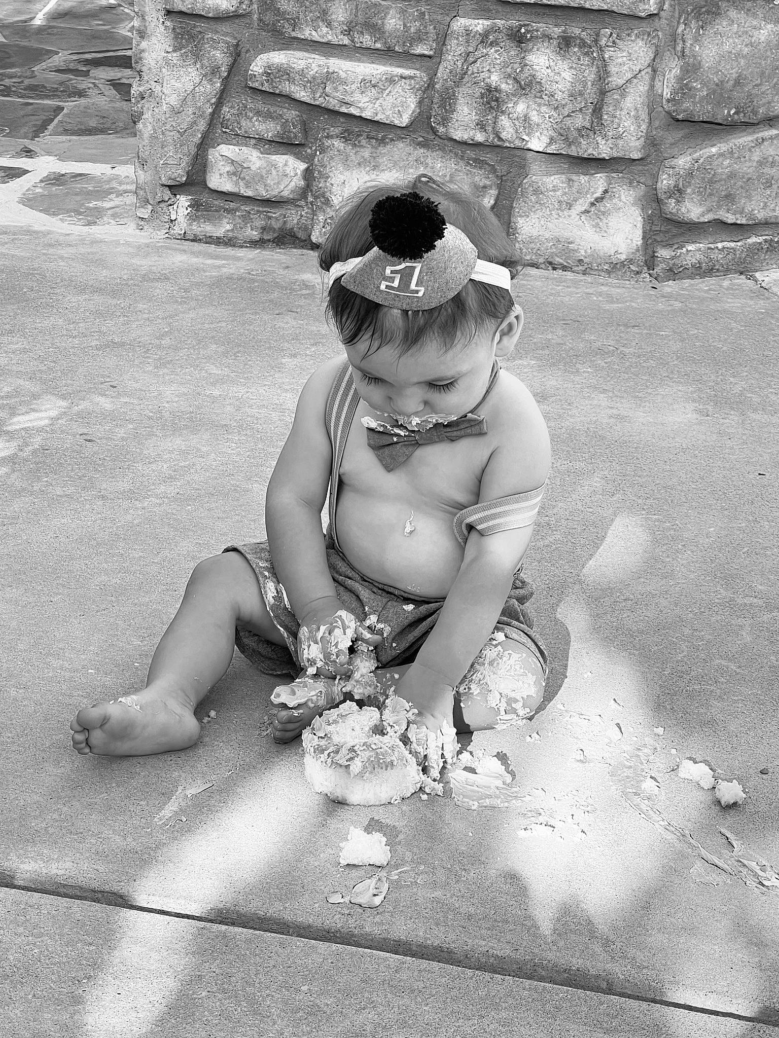 Jaxson is registered to the contest to win money with this photo: art, baby, barechested, black_and_white, chest, child, flooring, grass, happy, human_body, human_leg, monochrome, monochrome_photography, person, sidewalk, smile, snapshot, standing, style, sunglasses