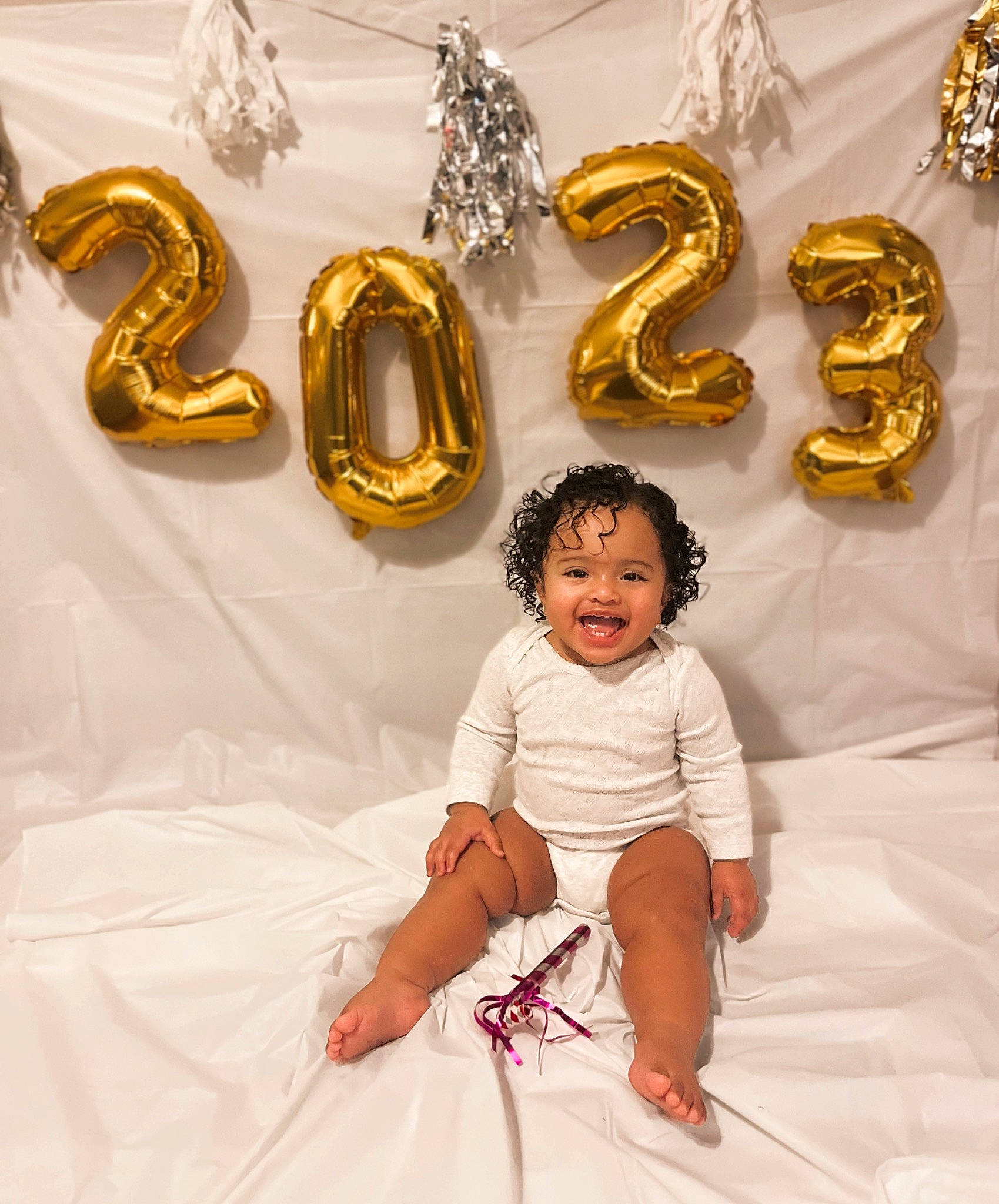 Maelynn joined the competition — help win amazing prizes! baby, baby_toddler_clothing, beauty, comfort, dress, event, fashion_accessory, fun, happy, head, human_body, metal, musical_instrument, person, sitting, sleeve, smile, symbol, toddler, white