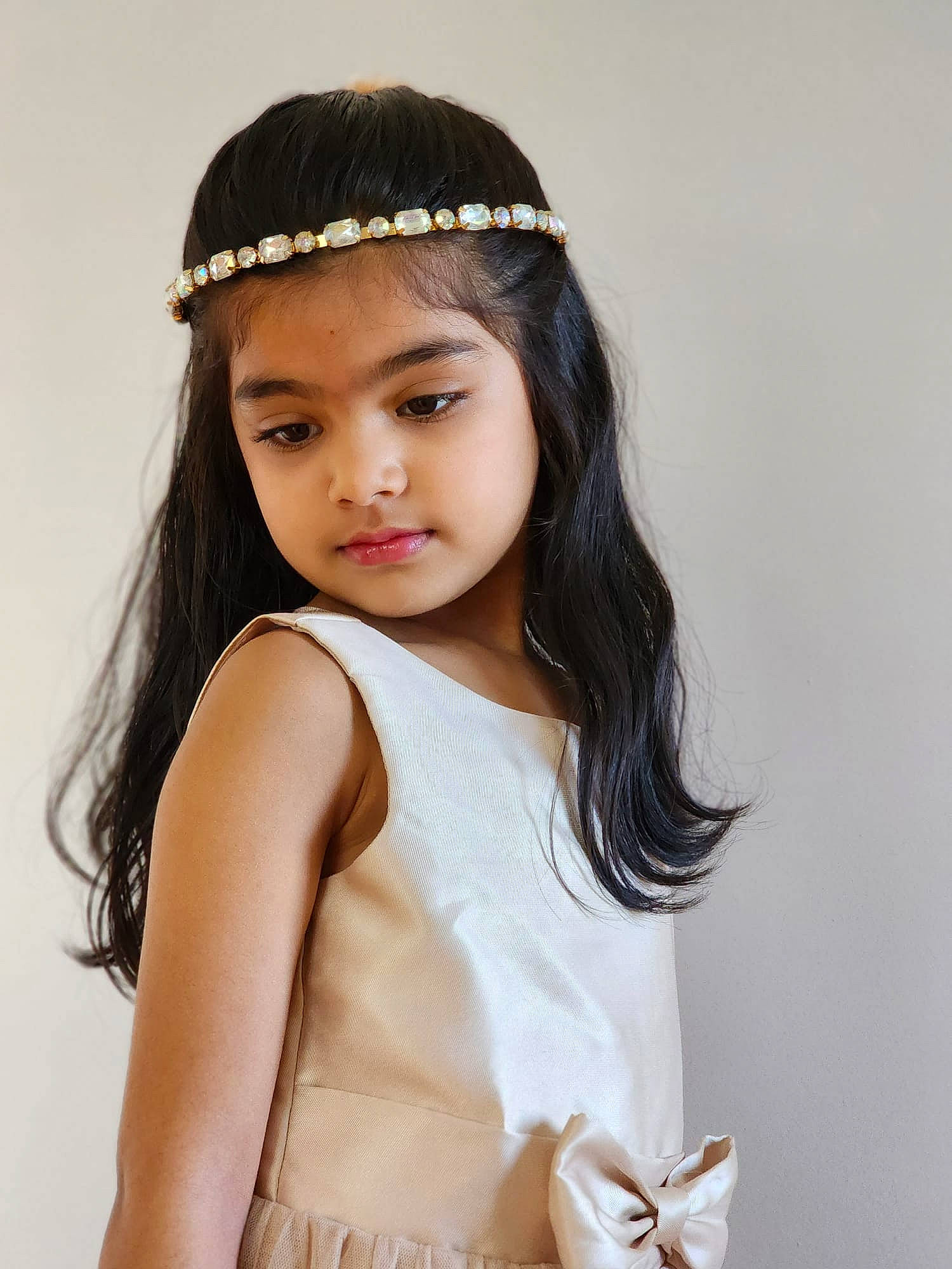 Aryahi is registered to the contest to win money with this photo: bangs, black_hair, chin, clothing, day_dress, eye, eyelash, fashion_design, flash_photography, hair, happy, headpiece, jewellery, lip, long_hair, neck, person, shoulder, skin, sleeve