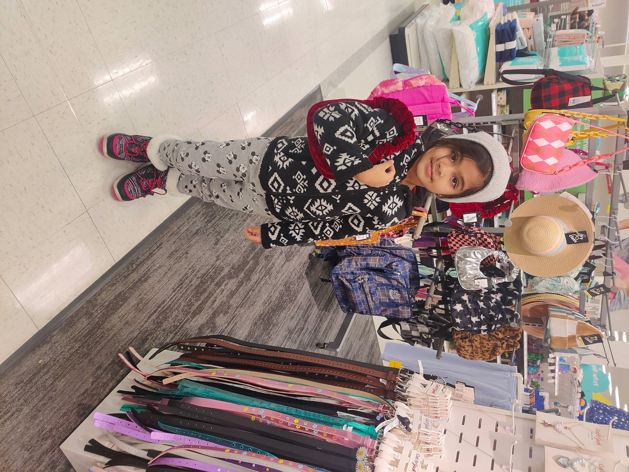 Aryahi is registered to the contest to win money with this photo: art, collection, dress, fashion_accessory, fashion_design, flooring, hardwood, hat, joy, magenta, pattern, person, pink, retail, room, sleeve, textile, toddler, visual_arts, wood