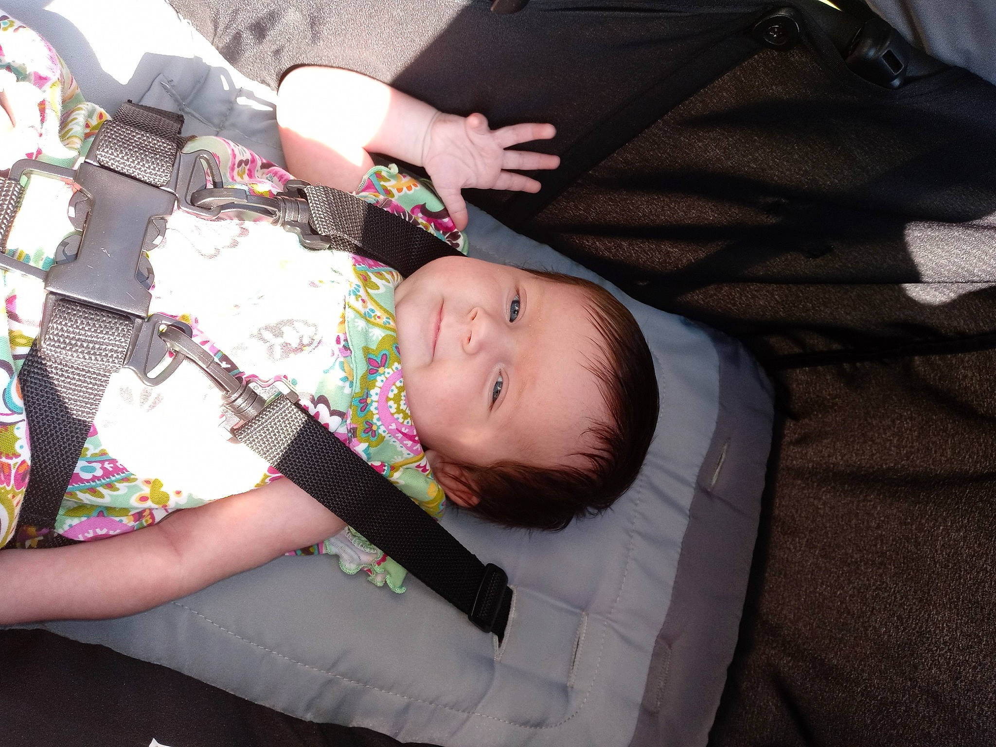 Laka is registered to the contest to win money with this photo: auto_part, baby, baby_carriage, baby_products, baby_toddler_clothing, car_seat, child, comfort, fun, lap, nail, pattern, person, sitting, toddler