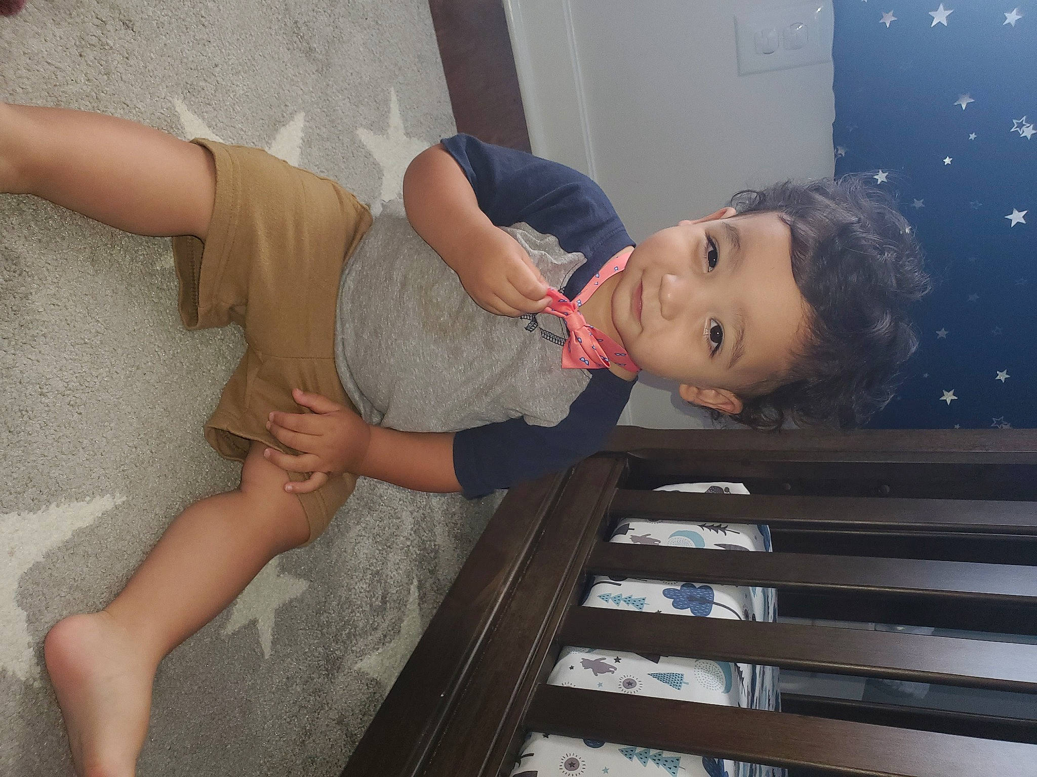 Donald is registered to the contest to win money with this photo: abdomen, black_hair, chest, elbow, flash_photography, fun, human_body, human_leg, joint, knee, leg, leisure, person, skin, smile, standing, thigh, toddler, trunk, waist