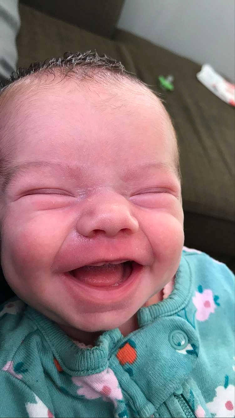Khloee is registered to the contest to win money with this photo: baby, baby_laughing, baby_toddler_clothing, cheek, child, ear, eyelash, gesture, happy, iris, lip, mouth, nose, person, pink, skin, smile, toddler, tongue, tooth