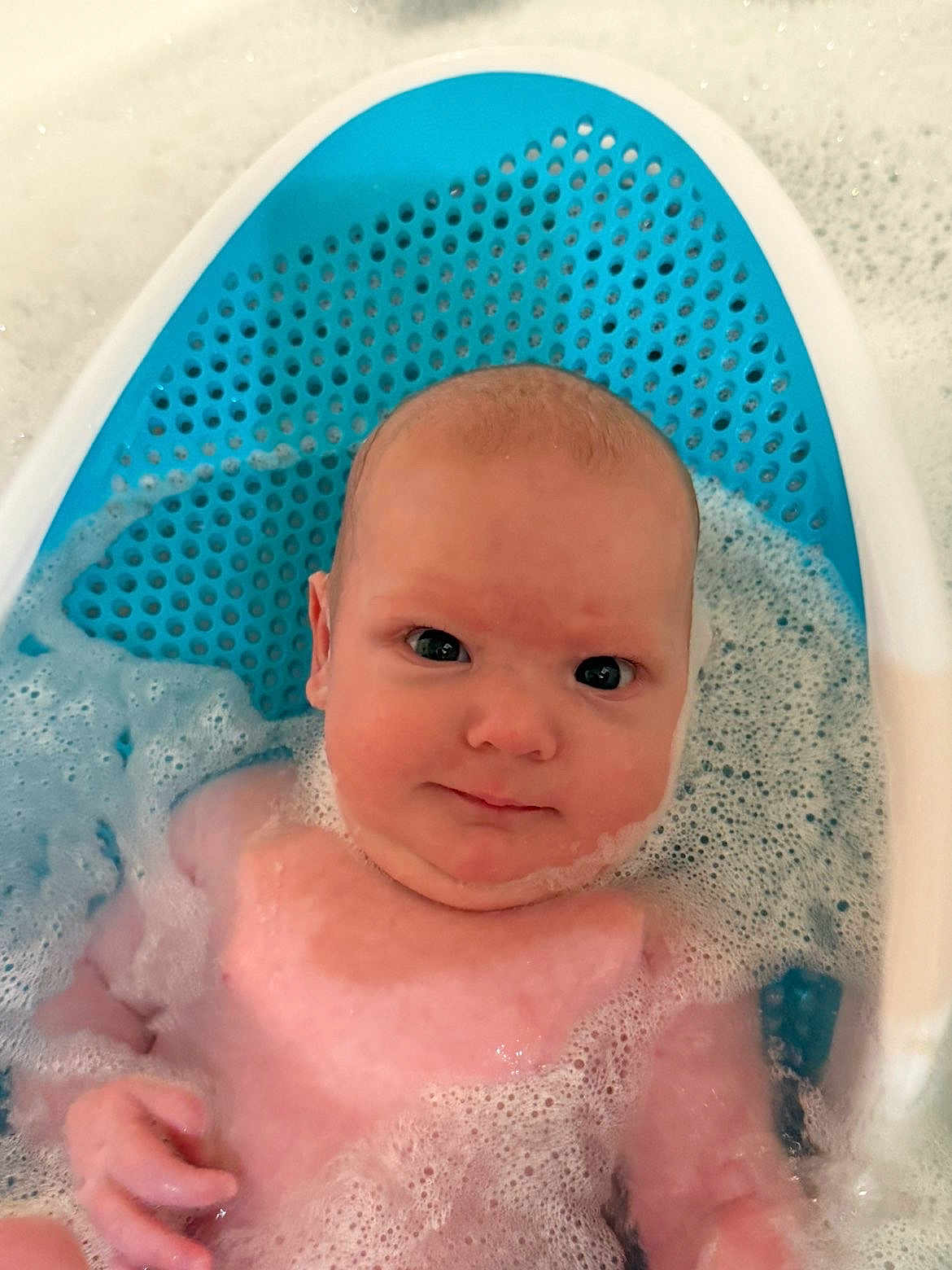 Autumn is registered to the contest to win money with this photo: baby, bath, bubbles, water, foam, infant, child, blue, skin, face, eyes, hand, tub, bathroom, cute, relaxing, sitting, young, person, clean