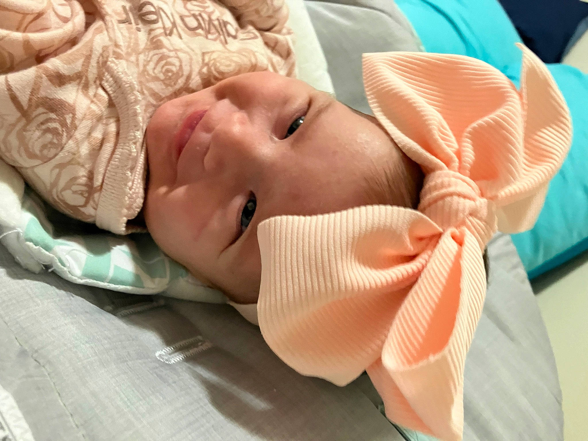 Kaelyn joined the competition — help win amazing prizes! baby, baby_products, baby_toddler_clothing, cheek, child, comfort, eyebrow, eyelash, finger, hand, hat, headwear, linens, lip, mouth, neck, nose, person, pink, skin