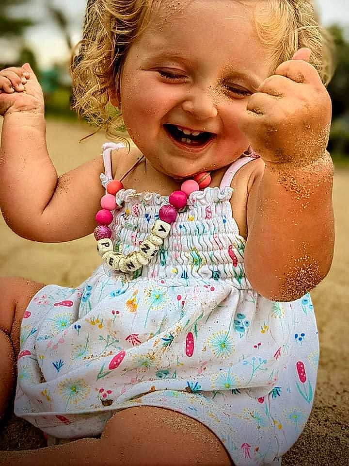 Penny joined the competition — help win amazing prizes! chin, eye, face, facial_expression, gesture, grass, hairstyle, hand, happy, head, human, human_body, joy, lip, muscle, organ, people_in_nature, person, pink, shoulder