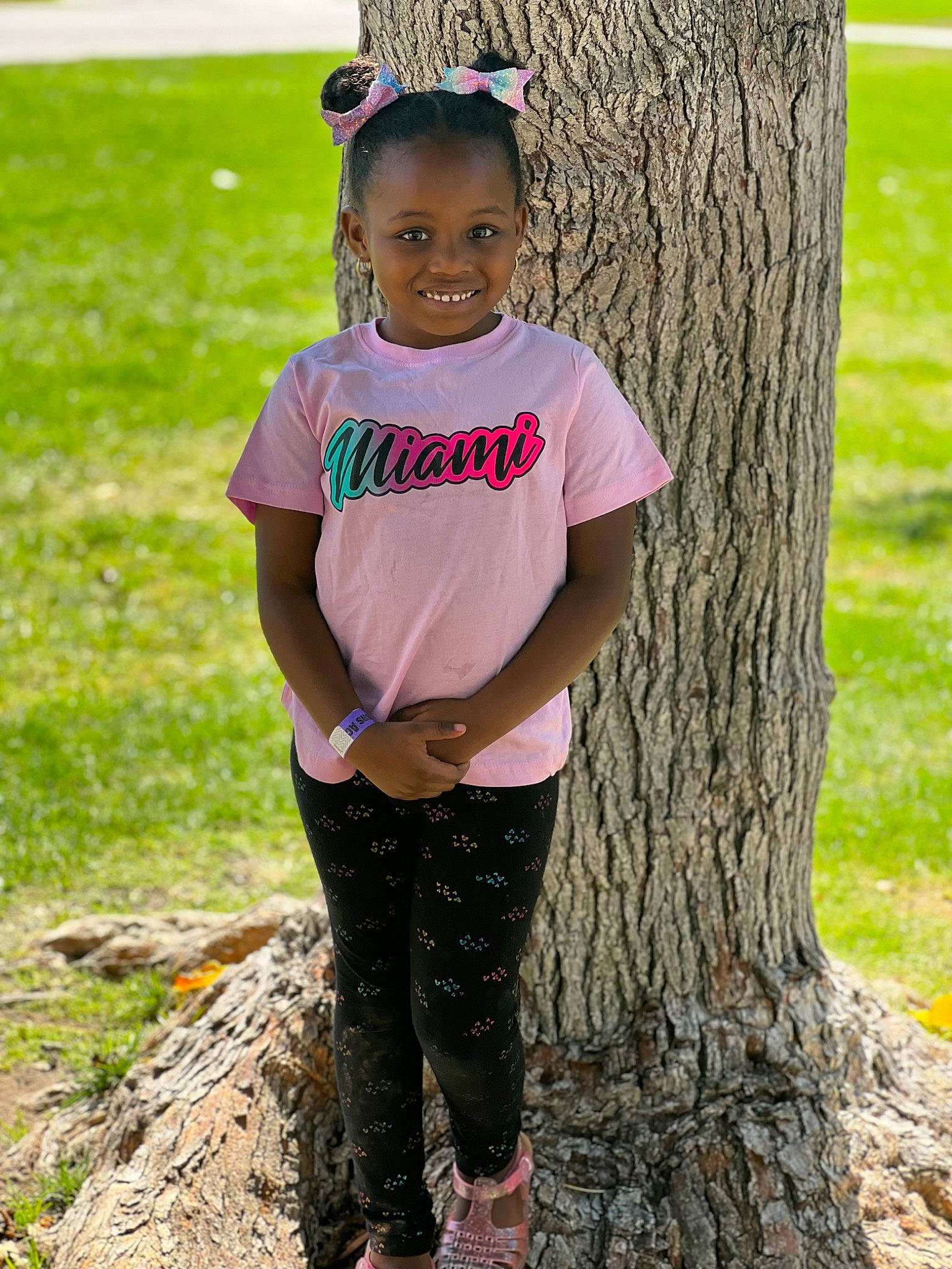 Royalty joined the competition — help win amazing prizes! black_hair, child, eyewear, grass, happy, head, jewellery, joy, leg, leisure, magenta, people_in_nature, person, recreation, sleeve, t_shirt, thigh, toddler, tree, trunk