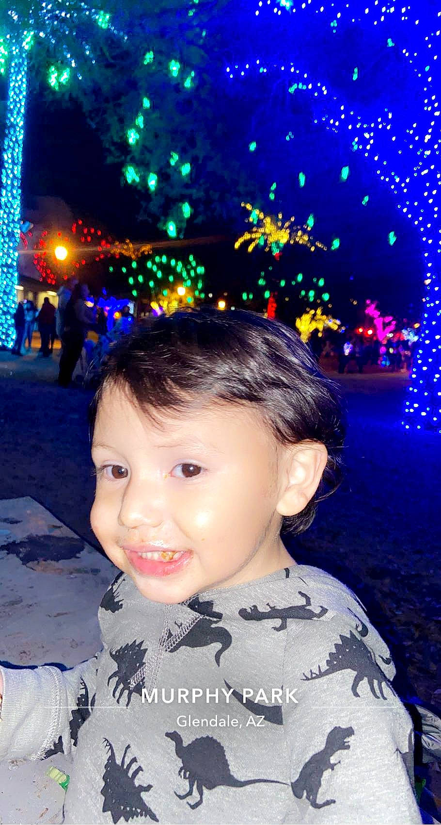 Giovanni is registered to the contest to win money with this photo: black, blue, eye, face, flash_photography, fun, hair, happy, human, joy, light, lighting, people_in_nature, person, photograph, plant, smile, standing, toddler, tree