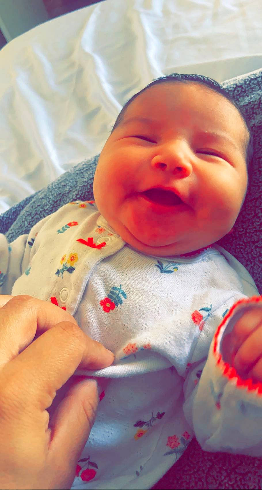 Cynthia joined the competition — help win amazing prizes! baby, baby_toddler_clothing, cheek, child, chin, comfort, face, finger, hand, happy, lip, mouth, nose, orange, person, skin, sleeve, smile, textile, thumb