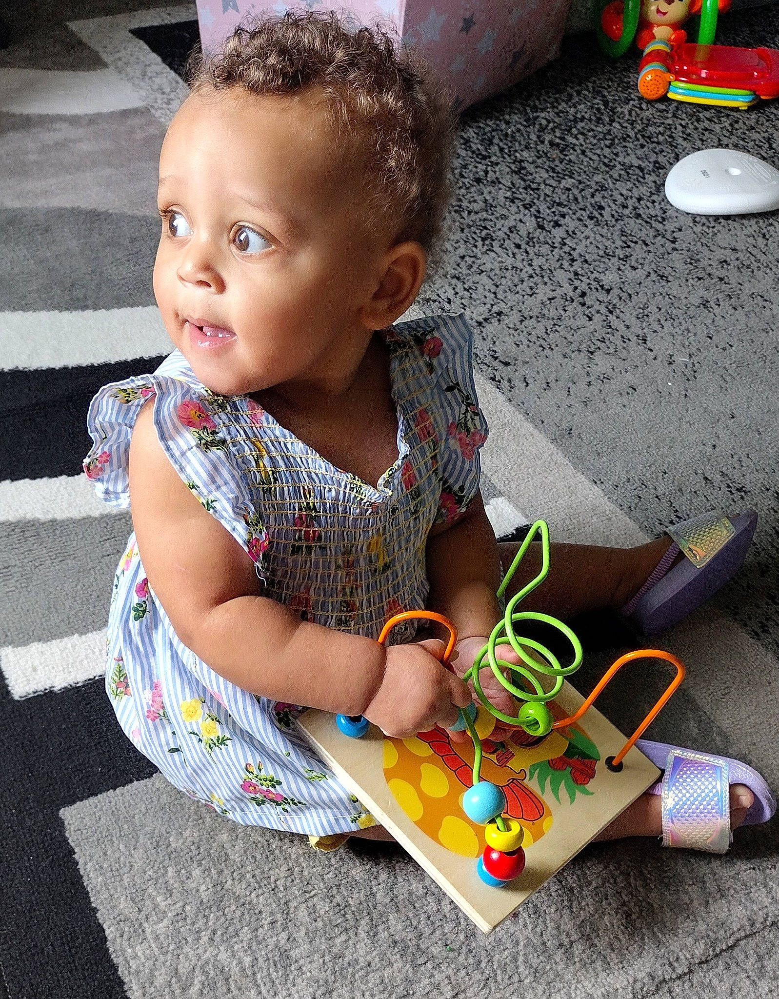 Zariyah joined the competition — help win amazing prizes! baby, baby_products, baby_toddler_clothing, child, dress, fashion_accessory, flooring, fun, grass, happy, headband, people, person, play, sitting, snapshot, summer, t_shirt, toddler, toy