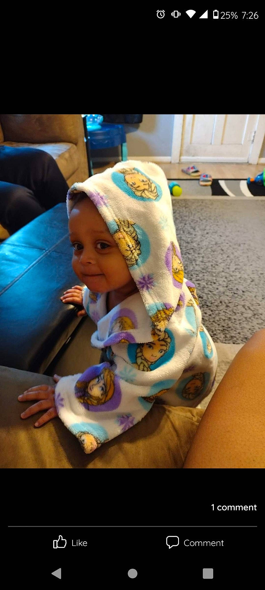 Zariyah is registered to the contest to win money with this photo: baby, baby_products, beanie, cap, chair, child, event, fashion_accessory, fun, headwear, human_leg, leisure, linens, nail, person, play, room, sitting, sweetness, toddler