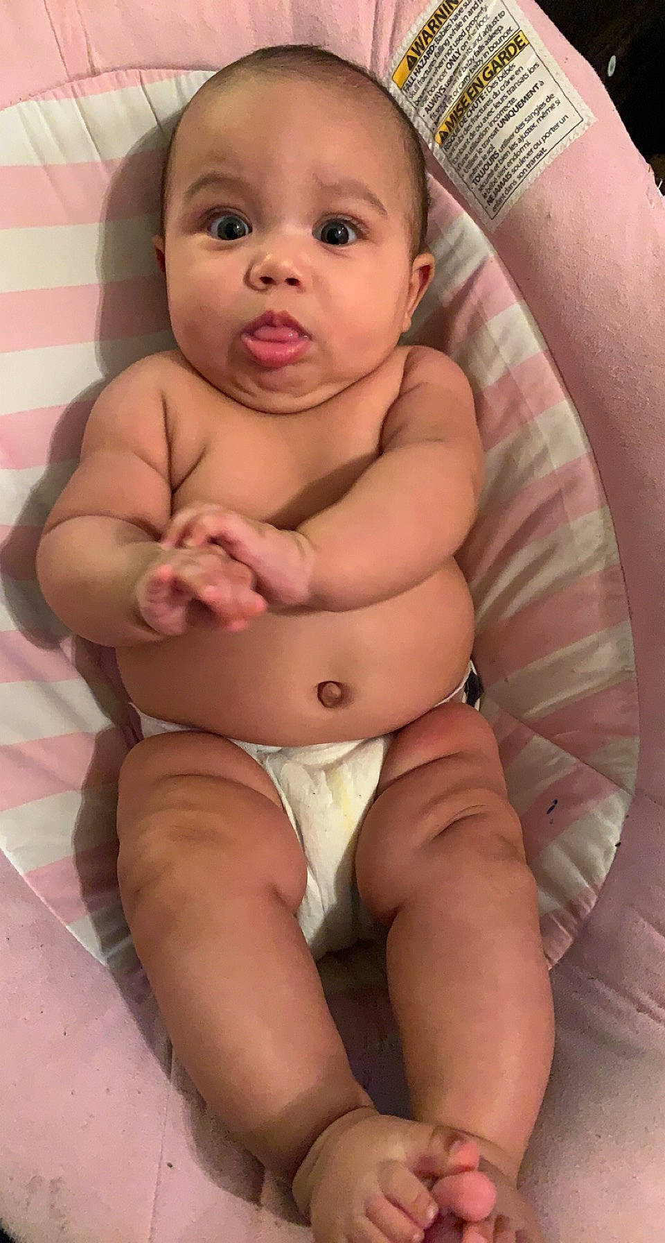 Neveah is registered to the contest to win money with this photo: arm, baby, cheek, chest, comfort, facial_expression, finger, human_body, joint, knee, leg, mouth, muscle, neck, organ, person, skin, stomach, thigh, thumb