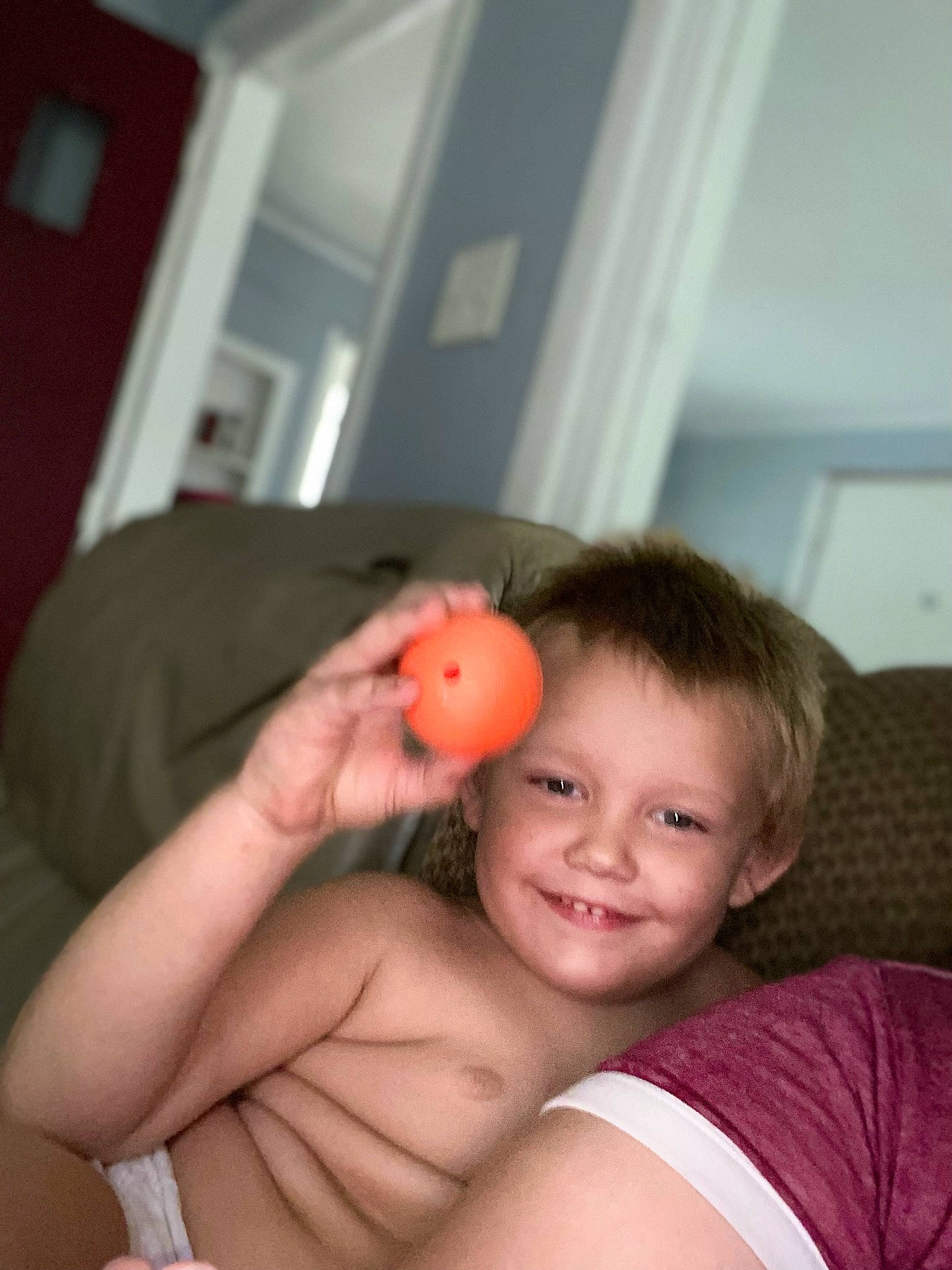 Ayden is registered to the contest to win money with this photo: arm, ball, eye, face, finger, fruit, gesture, hand, happy, human_body, joint, joy, leg, lip, mouth, neck, nose, person, plant, shoulder