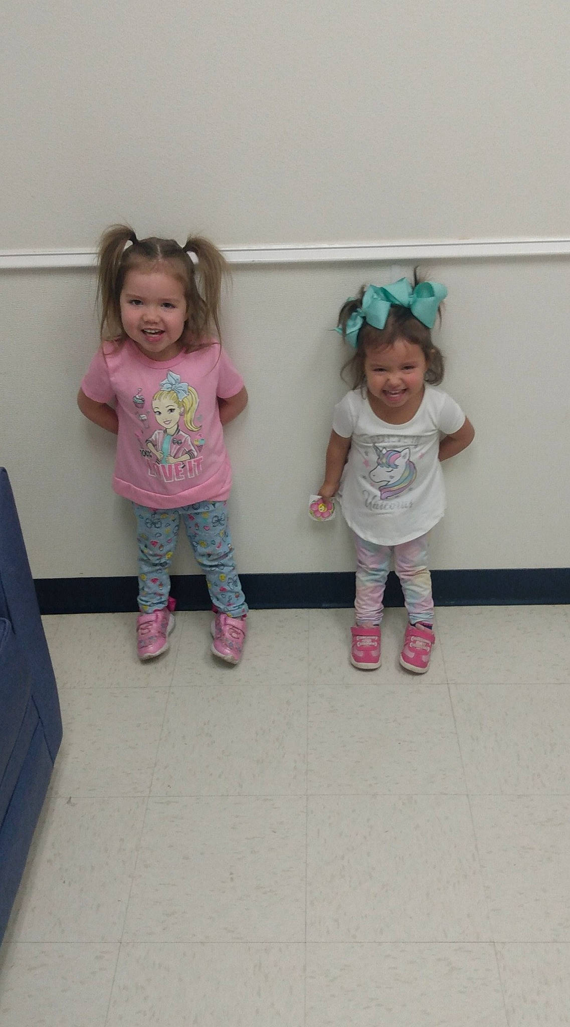 Annalisa is registered to the contest to win money with this photo: baby, baby_toddler_clothing, box, child, face, floor, happy, joy, nose, person, pink, shipping_box, skin, sleeve, sock, standing, toddler