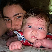 Ella is registered to the contest to win money with this photo: adult, baby, bed, bedroom, cushion, face, female, furniture, happy, head, homedecor, indoors, newborn, person, photography, portrait, quilt, room, selfie, woman