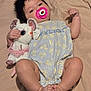 baby, infant, pacifier, plush_toy, stuffed_animal, blue_romper, yellow_flowers, blanket, lying_down, cute, child, soft_toy, indoor, skin, hand, foot, face, head, pink, sleepy