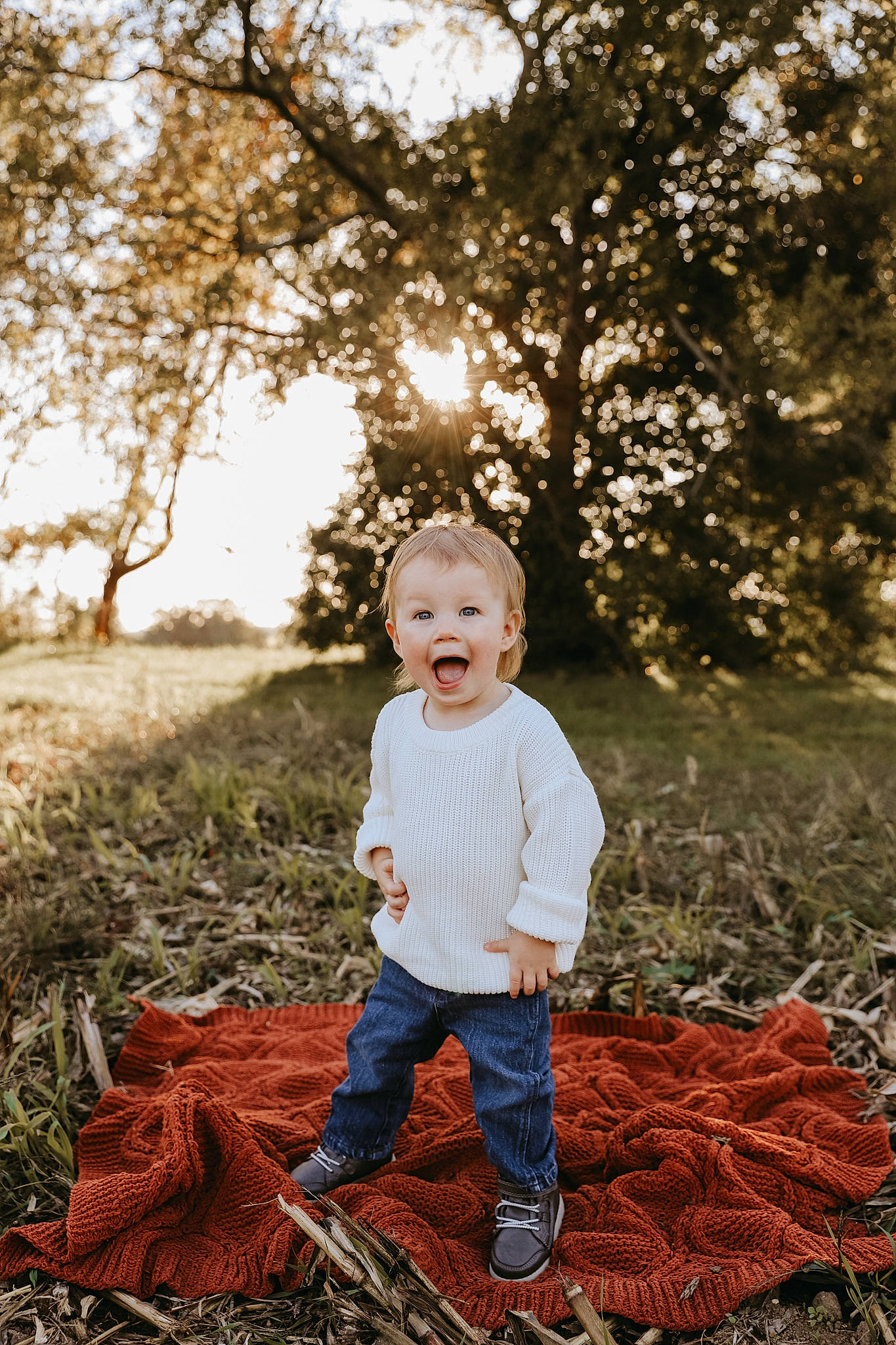 Brantley joined the competition — help win amazing prizes! baby, branch, child, flash_photography, forest, grass, happy, leaf, morning, nature, people_in_nature, person, plant, sky, smile, sunlight, tints_and_shades, toddler, tree, wood