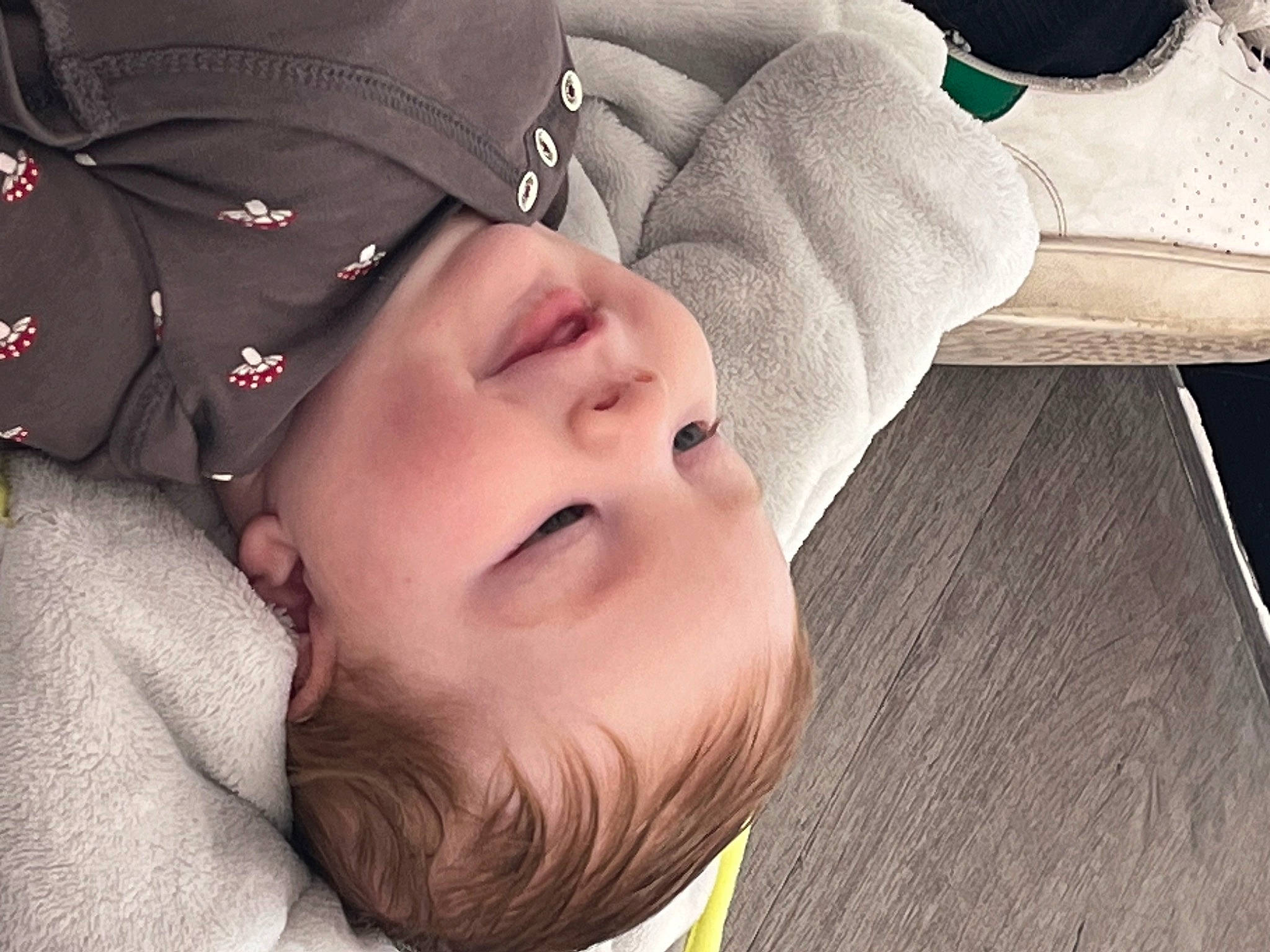 Aaron participe au concours pour gagner de l'argent avec cette photo : baby, baby_products, baby_toddler_clothing, cap, cheek, child, comfort, eyelash, flash_photography, fun, gesture, happy, lip, mouth, nap, nose, person, portrait_photography, skin, toddler