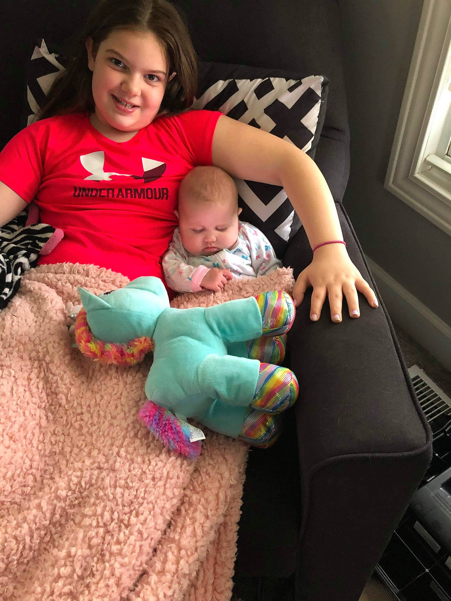 Abbie is registered to the contest to win money with this photo: arm, baby, birth, chair, child, comfort, family, fun, furniture, happy, head, joy, lap, leg, people, person, play, sitting, skin, smile