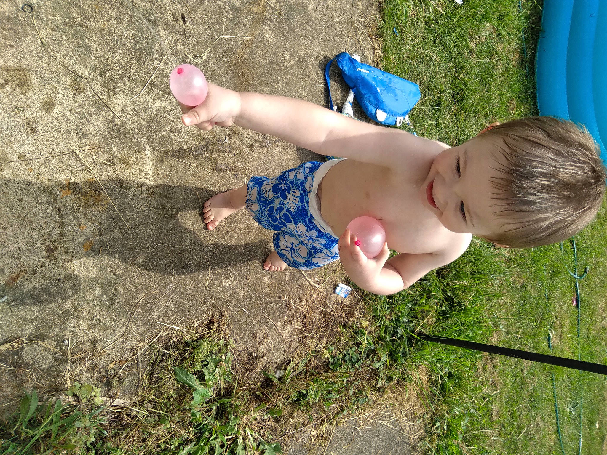 Mavrick is registered to the contest to win money with this photo: baby, baby_toddler_clothing, barechested, barefoot, blue, chest, finger, grass, grass_family, hand, happy, human_leg, leg, leisure, meadow, people_in_nature, person, plant, thigh, toddler