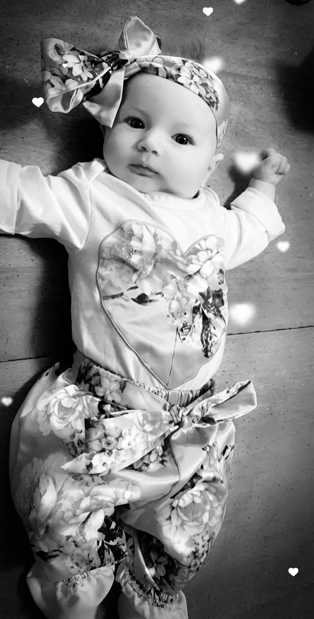 Miyah is registered to the contest to win money with this photo: black_and_white, child, hair_accessory, headpiece, monochrome, monochrome_photography, person, photography, style, toddler