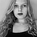 Chloe V.