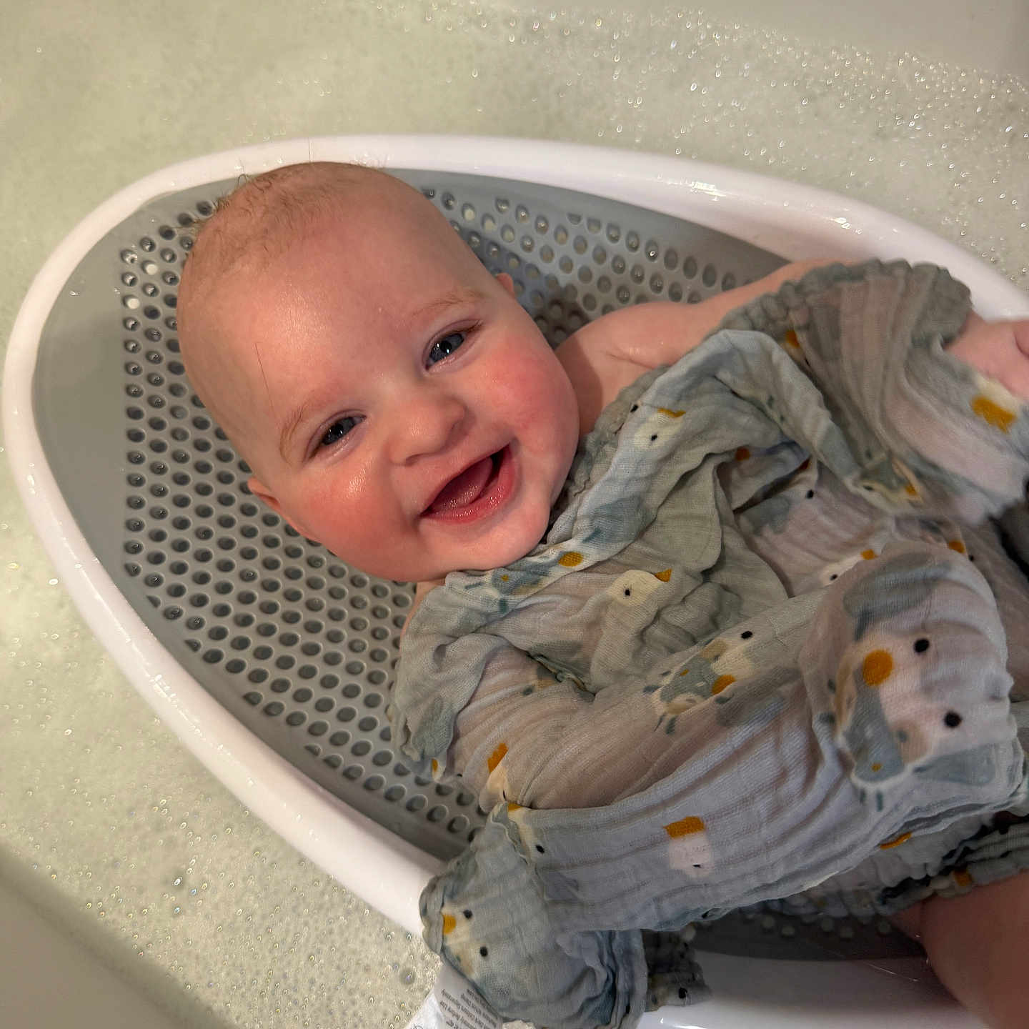 Colson joined the competition — help win amazing prizes! baby, bath, bathtub, blanket, bubbles, child, comfort, cute, duck_pattern, face, happy, head, infant, joy, muslin, person, sitting, skin, smiling, water