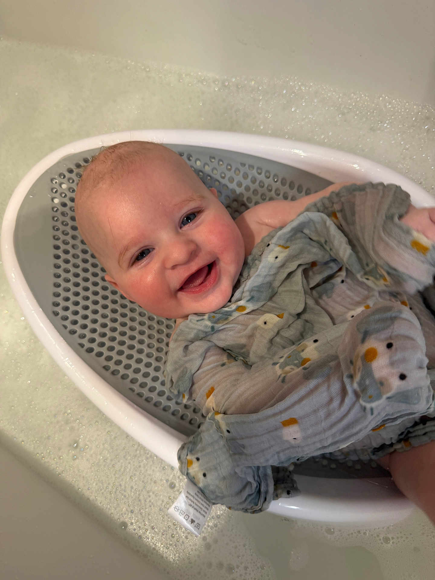 Colson joined the competition — help win amazing prizes! baby, bath, bathtub, blanket, bubbles, child, comfort, cute, duck_pattern, face, happy, head, infant, joy, muslin, person, sitting, skin, smiling, water