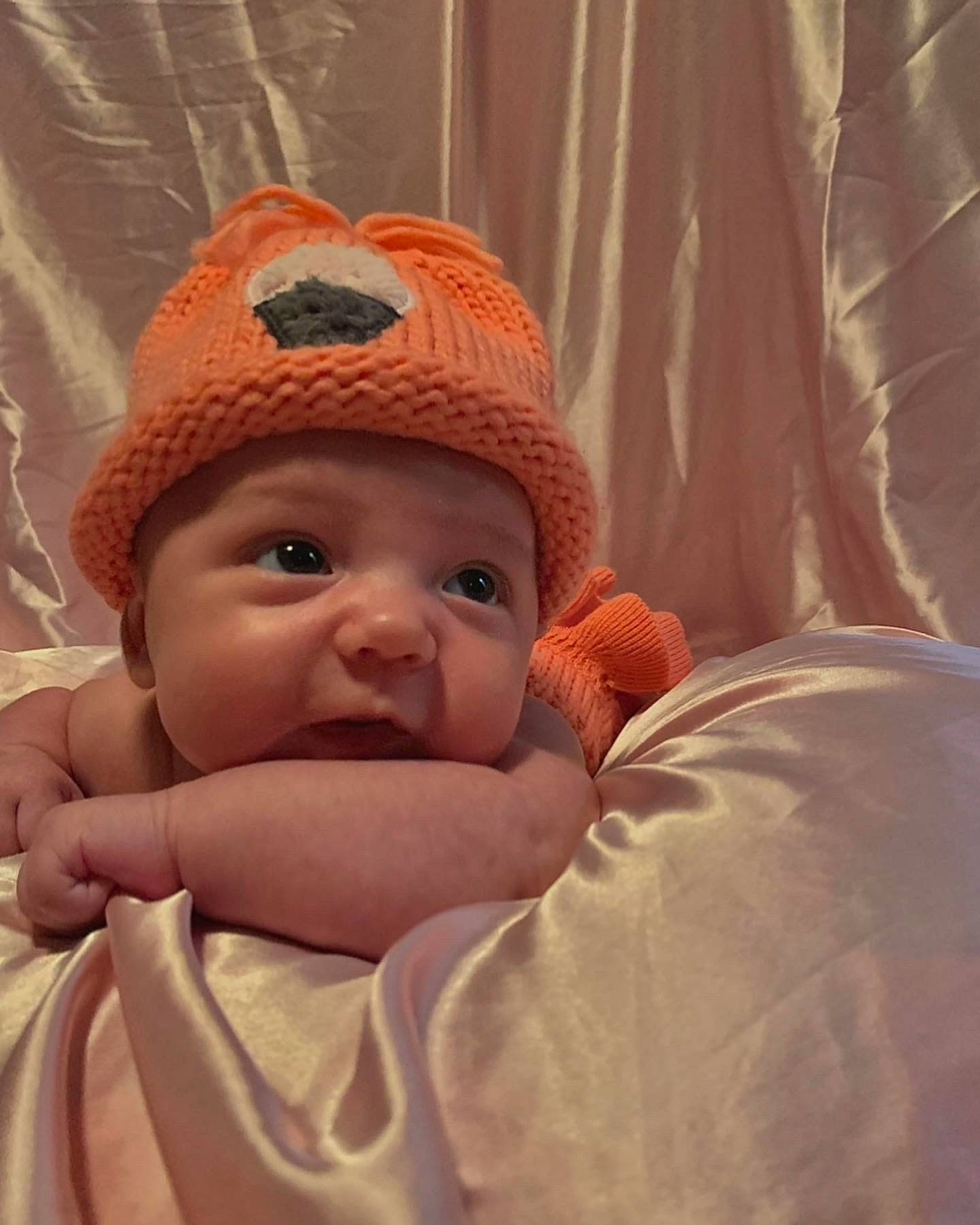 Kamilla is registered to the contest to win money with this photo: baby, baby_toddler_clothing, cap, cheek, child, comfort, curtain, face, fashion_accessory, fun, happy, hat, headwear, linens, lip, nose, peach, person, room, smile