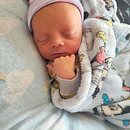 Alekzander is registered to the contest to win money with this photo: newborn, baby, sleeping, blanket, hat, cozy, infant, soft, cute, wrapped, child, peaceful, portrait, indoors, rest, comfort, warm, small, face, hand