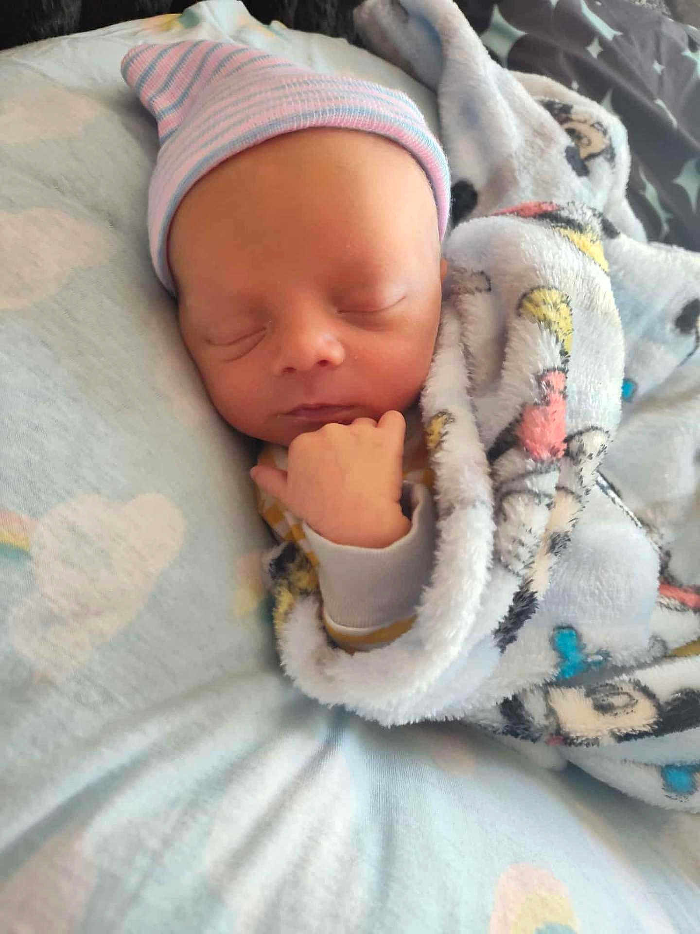 Alekzander is registered to the contest to win money with this photo: newborn, baby, sleeping, blanket, hat, cozy, infant, soft, cute, wrapped, child, peaceful, portrait, indoors, rest, comfort, warm, small, face, hand