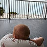 Beau joined the competition — help win amazing prizes! baby, infant, inflatable_seat, bear_pattern, balcony, railing, beach, water, sky, cloudy, outdoor, concrete_floor, back_view, head, child, relaxing, summer, vacation, seaside, quiet