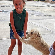 Natalie joined the competition — help win amazing prizes! animal, canine, child, clothing, dog, face, female, footwear, girl, head, pants, path, person, pet, photography, portrait, shoe, shorts, sneaker, walkway