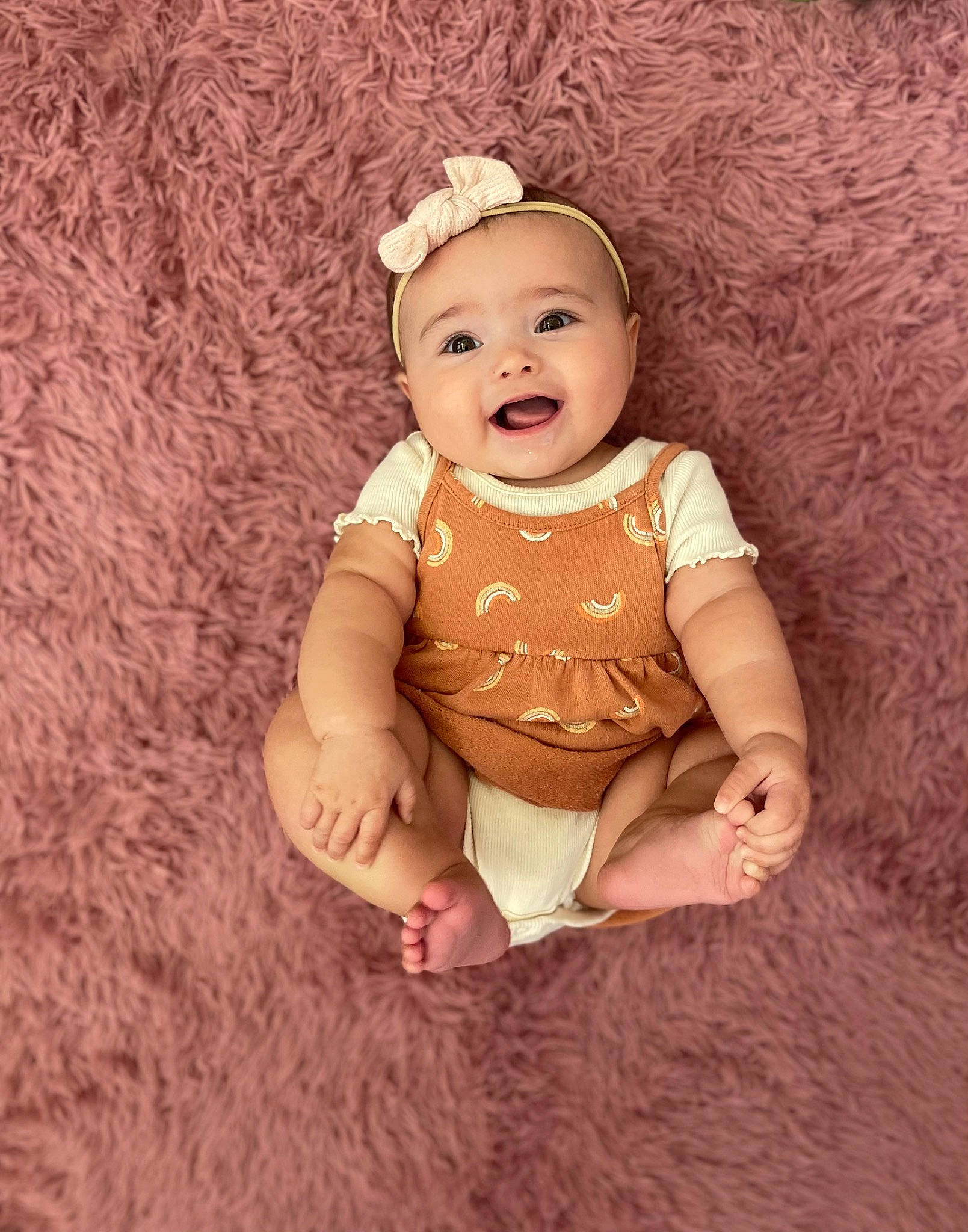 Arielle joined the competition — help win amazing prizes! baby, baby_toddler_clothing, cheek, chin, clothing, dress, eye, face, flash_photography, flooring, fun, happy, head, headgear, human_body, person, pink, sleeve, smile, toddler