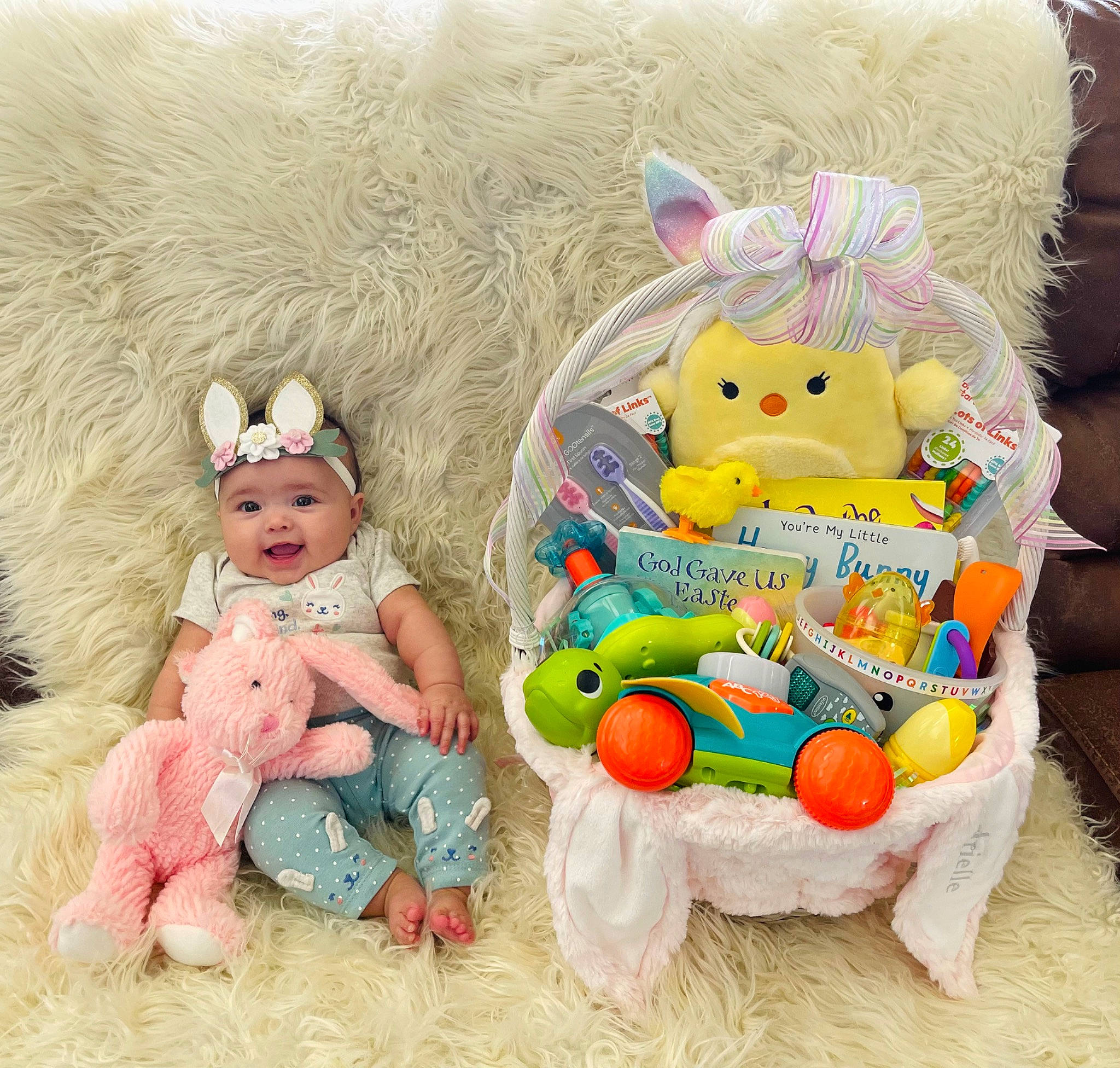 Arielle is registered to the contest to win money with this photo: art, baby, baby_products, baby_toddler_clothing, baby_toys, child, collectable, doll, event, fashion_accessory, font, happy, headwear, person, pink, play, plush, room, sitting, stuffed_toy